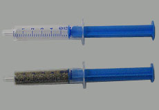 injekční stříkačka s pískem